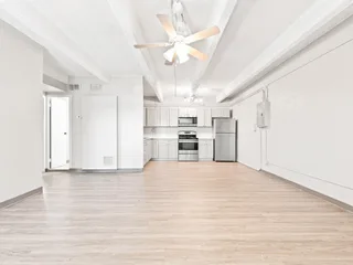 Open concept kitchen and living room at Julian Square Apartments