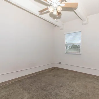 Julian Square Apartments carpeted bedroom