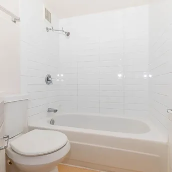 Julian Square Apartments bathroom tub and shower