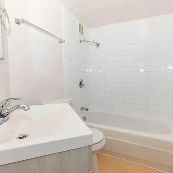 Julian Square Apartments bathroom tub and vanity alternate view