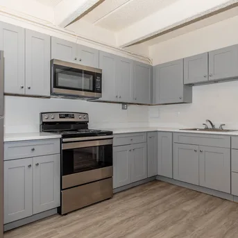 Julian Square Apartments kitchen with stainless steel appliances