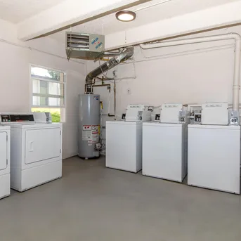 On-site laundry room at Julian Square Apartments